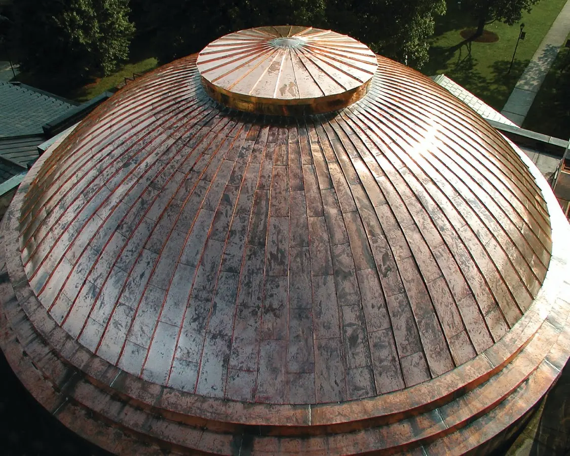 Craftsman Roofing crew installing a new roof in Woodland Park